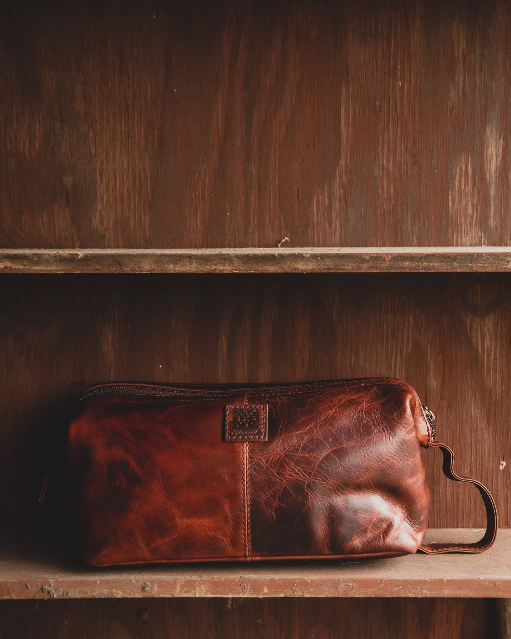 Ashwood wash bag seb on Wooden Shelf vintage tan