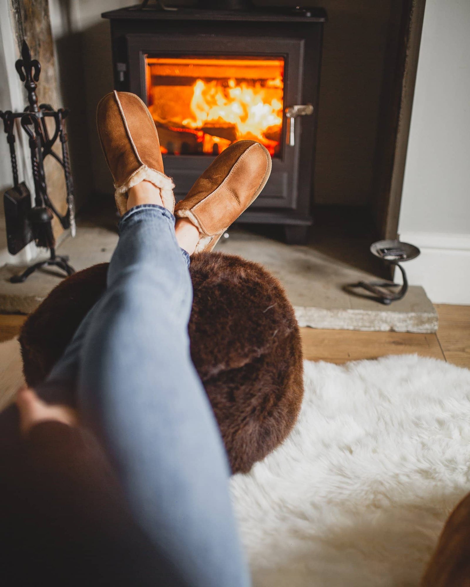 Shepherd womens sheepskin slippers ANNIE cognac model walking downstairs