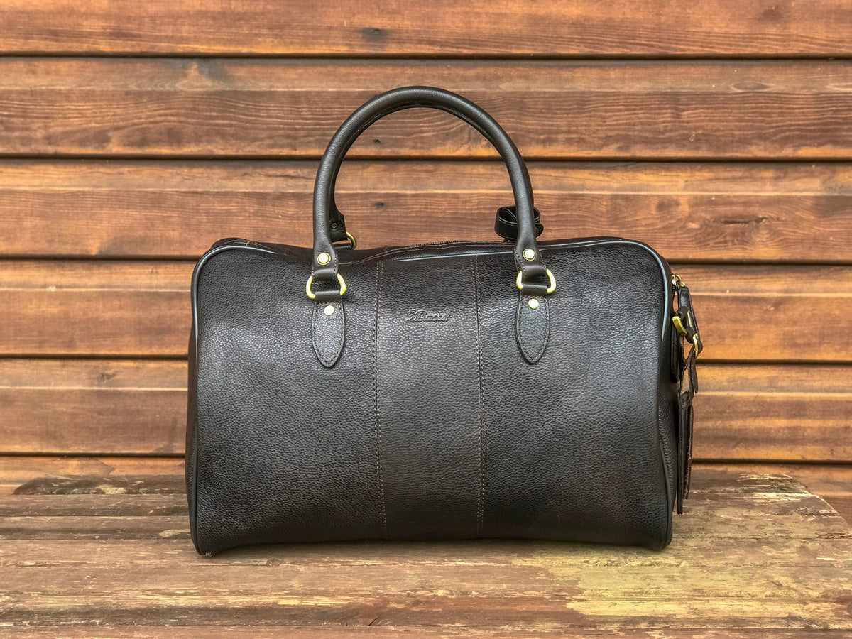 Ashwood leather holdall brown on wooden background front on