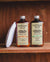 Chamberlains Leather Milk Pack of Lintment 1 and 2 on wooden shelf with pad