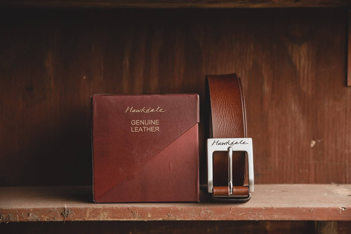 Hawkdale mens leather belt 811-400 brown on wooden shelf 