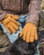 Nordvek mens sheepskin navy gloves holding rake 304-100