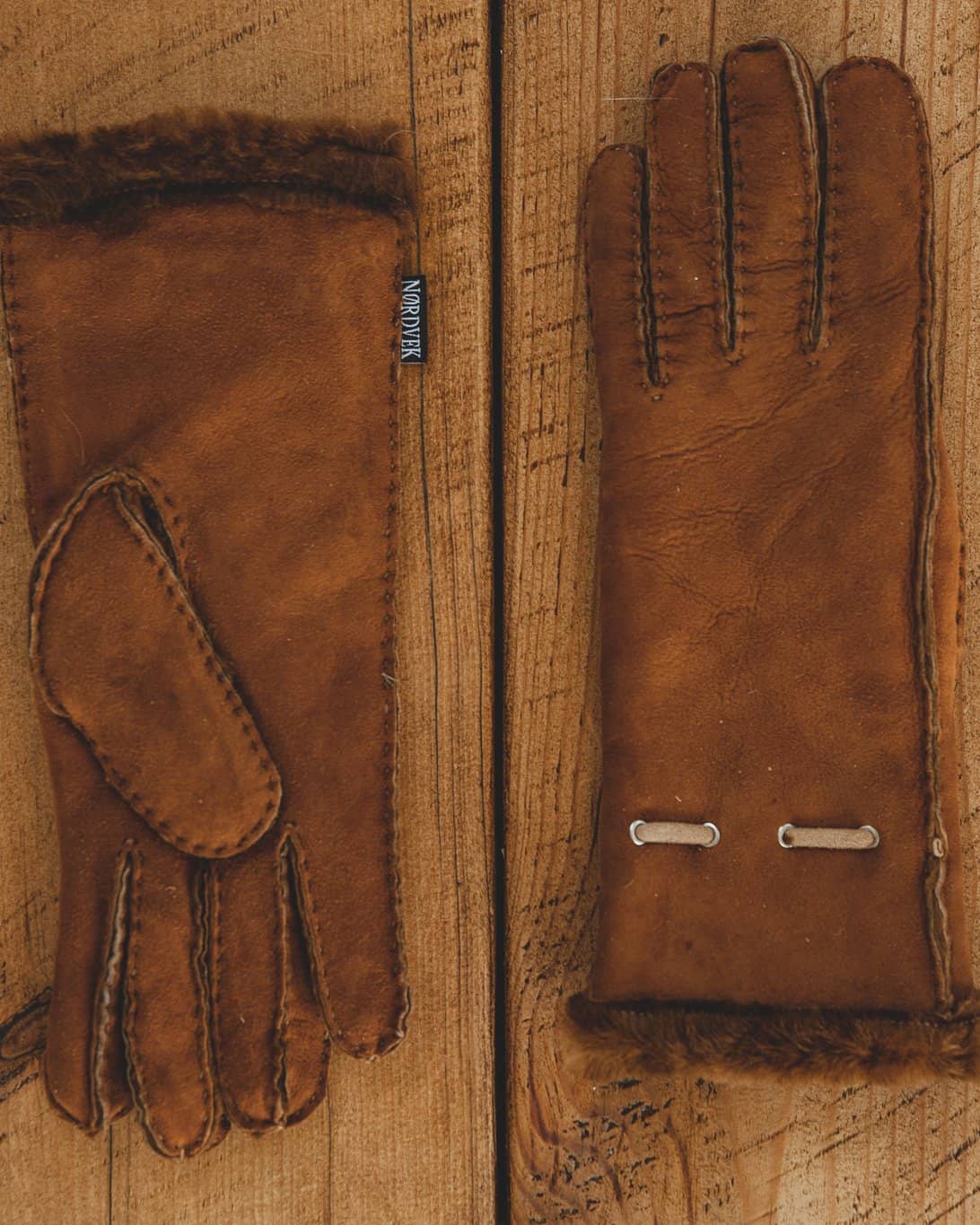 Nordvek womens sheepskin gloves 317-100 autumnal brown side by side on wooden floor
