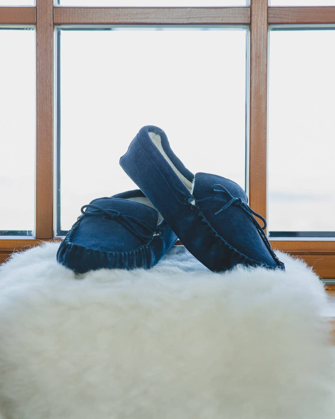 Nordvek mens moccasins soft sole  423-100 navy pair in front of window