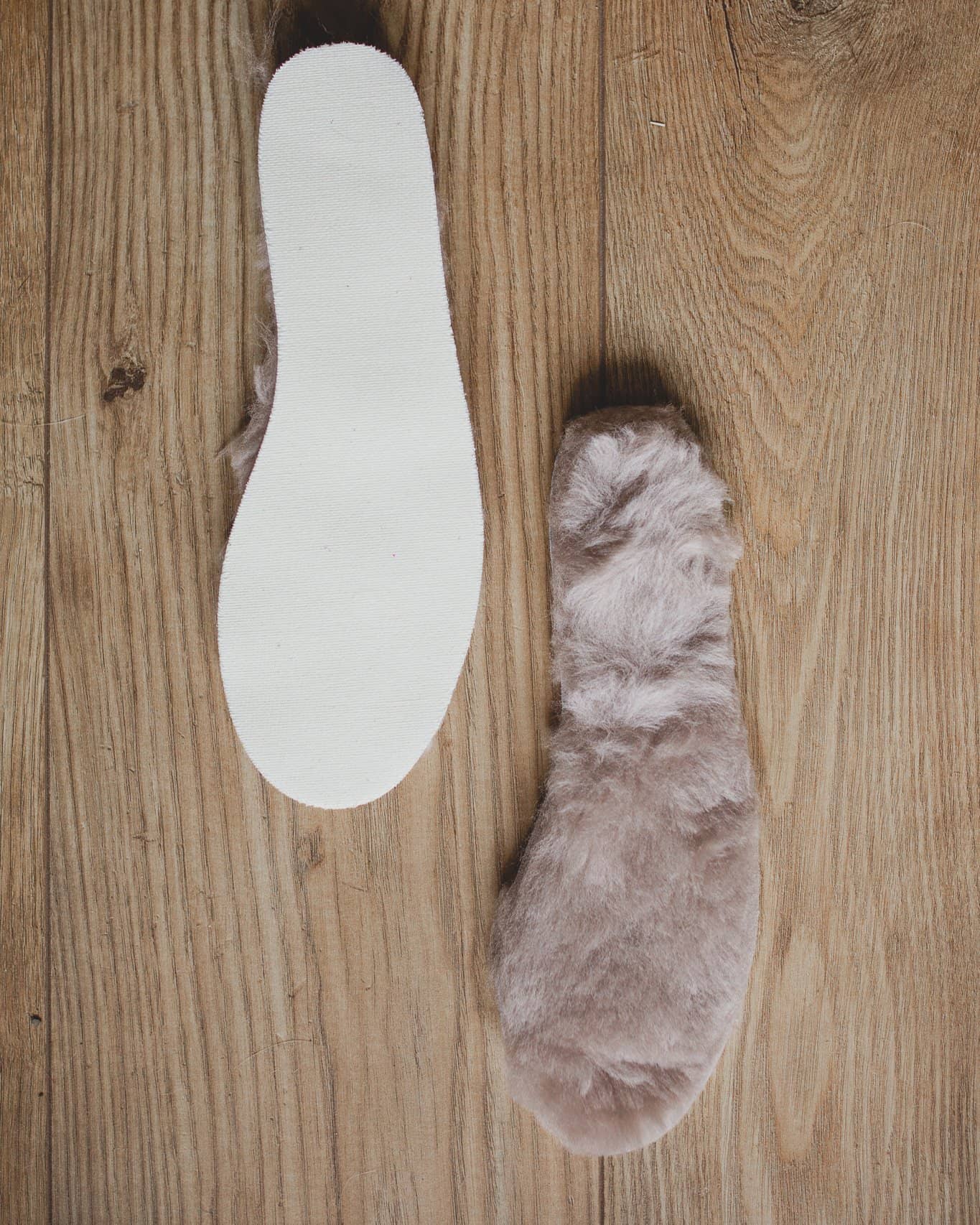 Nordvek kids sheepskin insoles 498-100 stone in front of fire