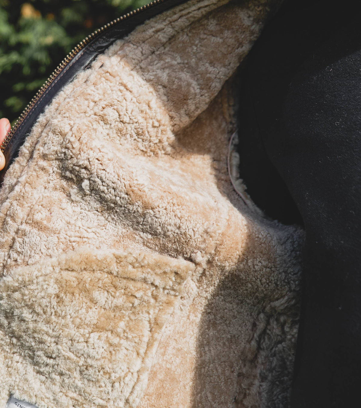 Nordvek mens sheepskin jacket 702-100 chocolate on model holding open to see lining