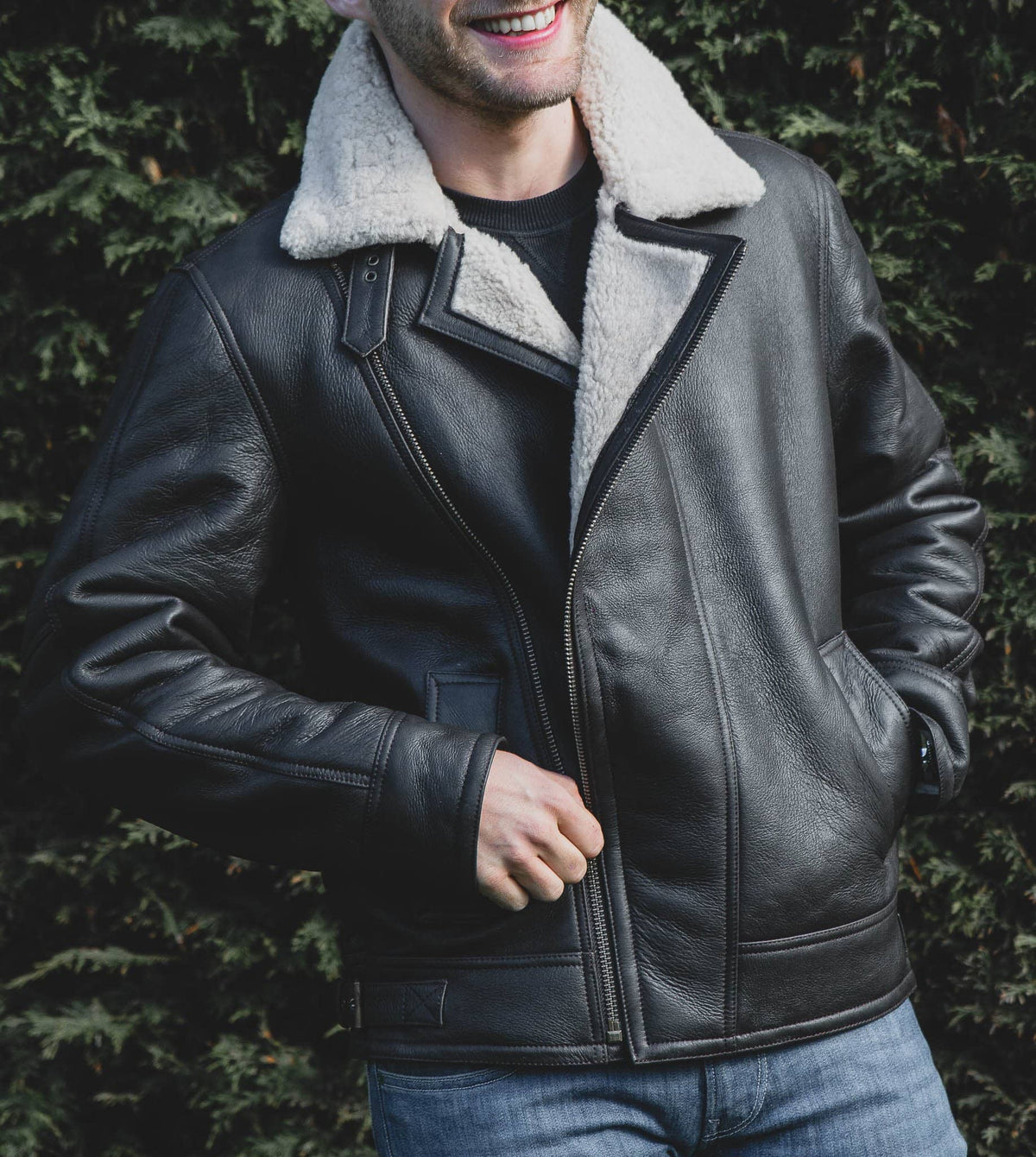 Nordvek mens sheepskin jacket 703-100 dark brown on model zipping up smiling