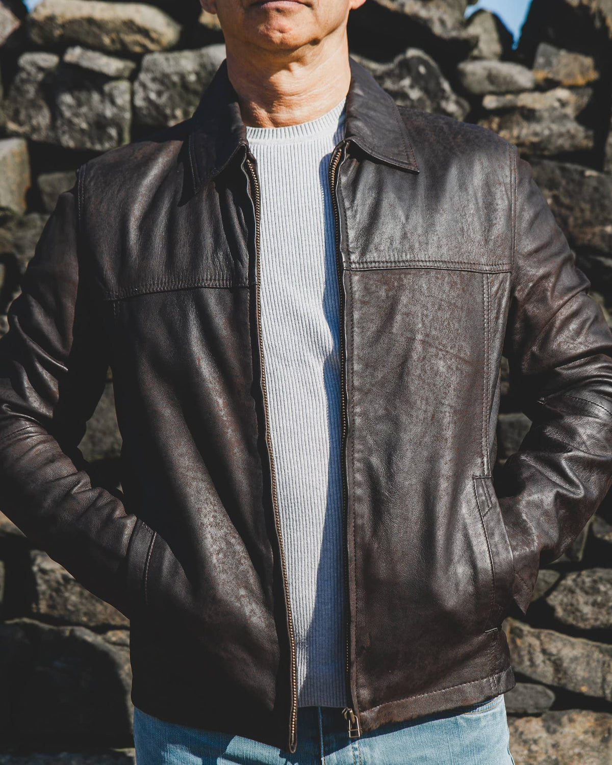 Handsome rider guy in black biker jacket on classic style cafe racer  motorcycle at sunset. Bike custom made in vintage garage. Brutal fun  lifestyle. Stock Photo | Adobe Stock