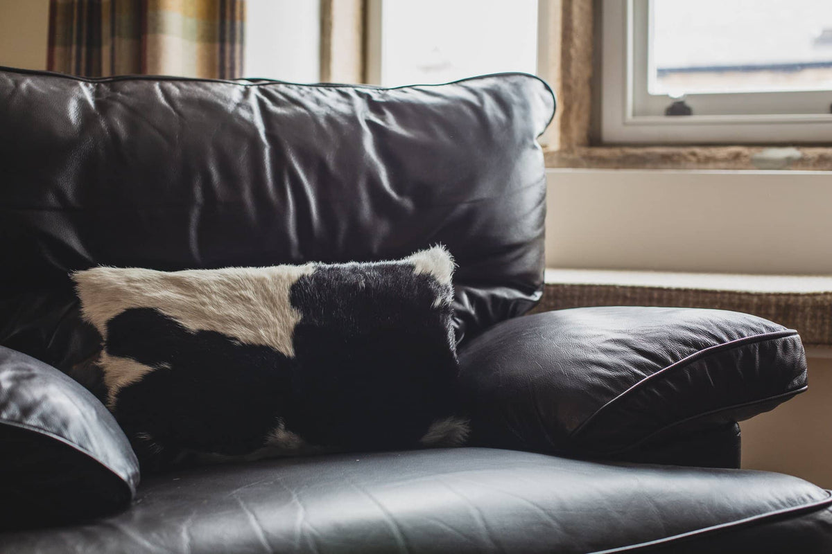 Nordvek cowhide cushion black on sofa 9008-100