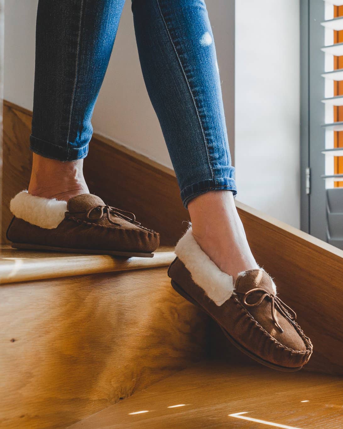 Nordvek womens moccasins hard sole  417-100 chestnut pair model wearing down stairs