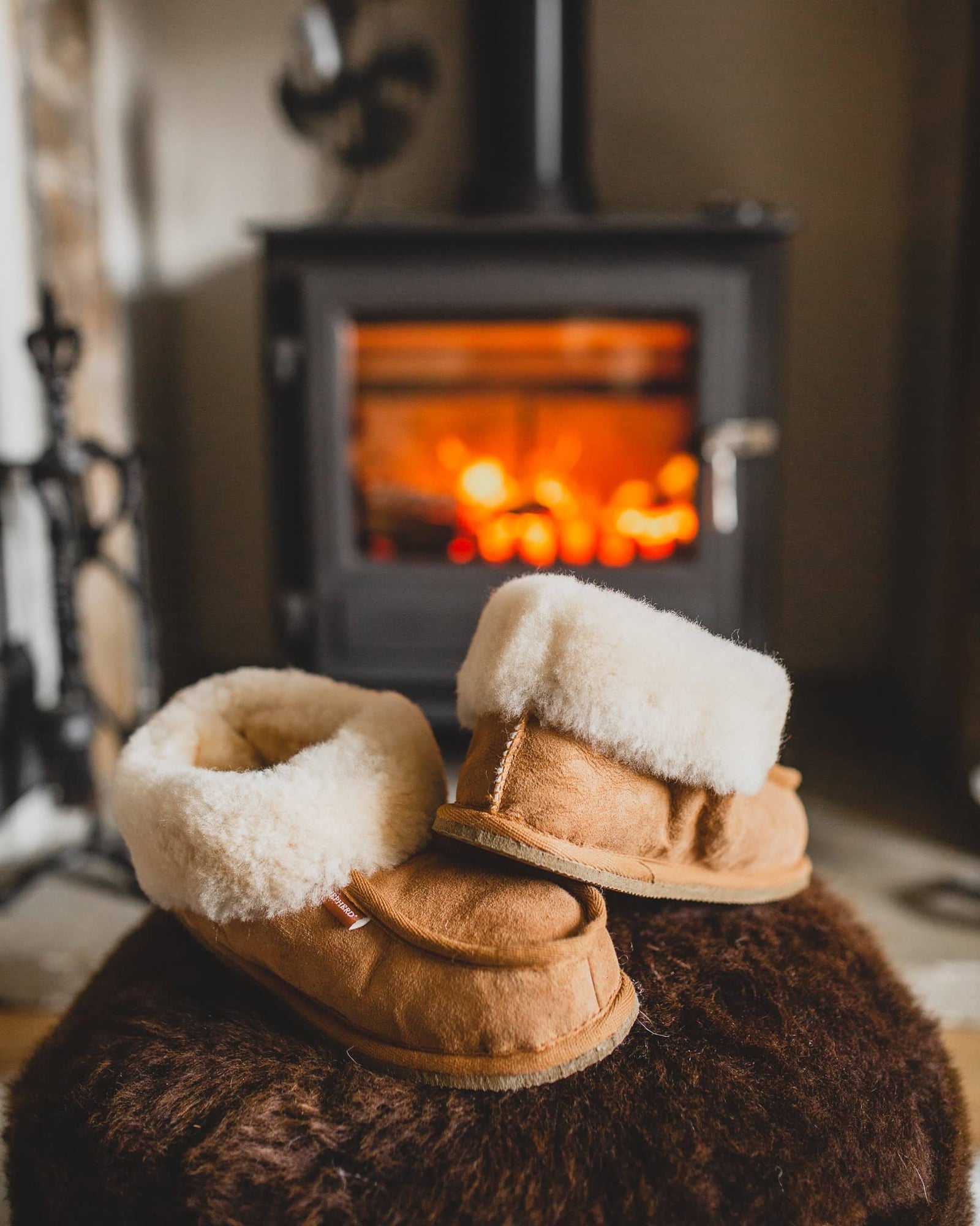 shepherd womens sheepskin slippers LENA chestnut model walking downstairs