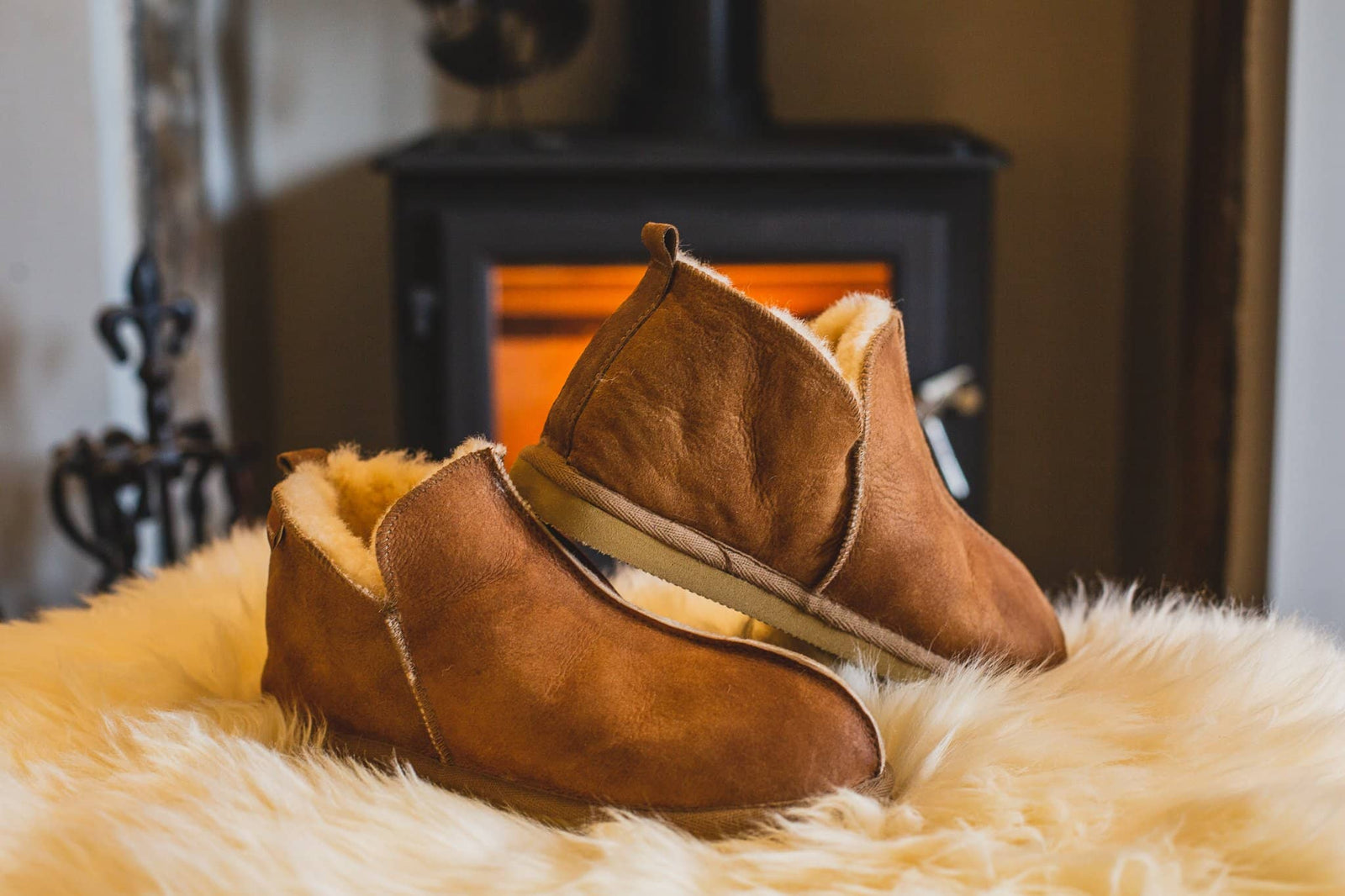 Shepherd womens sheepskin slippers ANNIE cognac model walking downstairs